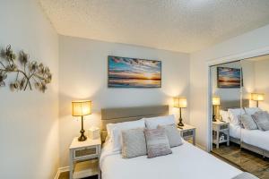 a bedroom with two beds and two lamps on tables at half Mi to Frisco Commons Park Poolside Oasis! in Frisco +22 photos