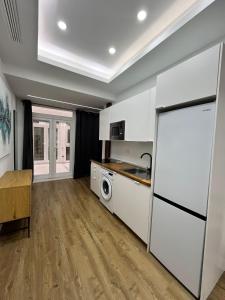 Kuchyňa alebo kuchynka v ubytovaní Exclusive Luxury Stay at Plaza Uncibay, Málaga Center