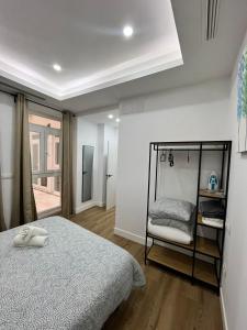 Posteľ alebo postele v izbe v ubytovaní Exclusive Luxury Stay at Plaza Uncibay, Málaga Center