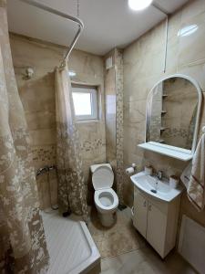 Ванна кімната в Apartman KVINS 1