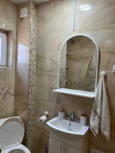 Koupelna v ubytování Apartman KVINS 1 + 14 fotografií