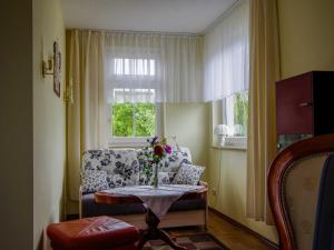 Ein Sitzbereich in der Unterkunft Ferienhaus Guenter