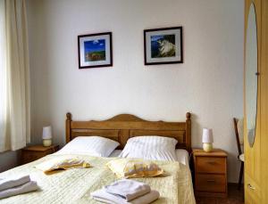 Ein Bett oder Betten in einem Zimmer der Unterkunft Ferienhaus Guenter