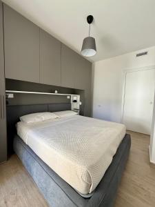 Ένα ή περισσότερα κρεβάτια σε δωμάτιο στο ANTO Wellness & Suite