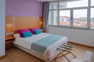 Hotel Faranda Marsol Candas, Ascend Hotel Collection客房内的一张或多张床位