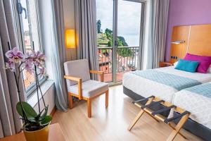 Hotel Faranda Marsol Candas, Ascend Hotel Collection客房内的一张或多张床位