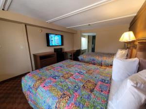 Postel nebo postele na pokoji v ubytování Stay Express Inn Athens