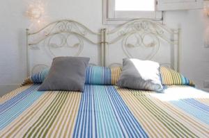 Postel nebo postele na pokoji v ubytování Trappito Stracca Agriturismo