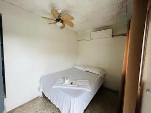 Postel nebo postele na pokoji v ubytování Hotel Central