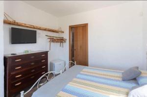 Postel nebo postele na pokoji v ubytování Trappito Stracca Agriturismo