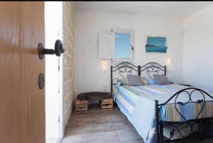 Postel nebo postele na pokoji v ubytování Trappito Stracca Agriturismo
