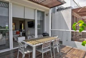 תמונה מהגלריה של Penthouse with Beach Acces and Golf course באקומל