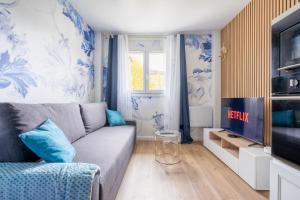 Et tv og/eller underholdning på East-Blue Appartement-Luxury