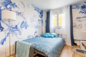 En eller flere senge i et værelse på East-Blue Appartement-Luxury