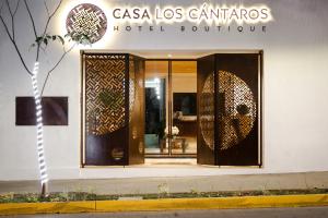 a casa los cantos hotel boutique with its doors open at Casa los Cantaros Hotel Boutique in Oaxaca City