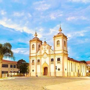 a large white building with two towers on top at Pousada Villa Giglio endereço Av Lucas Nogueira Garces x Rubens Paiva região nobre de Atibaia in Atibaia +146 photos