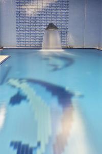 a close up of a swimming pool with blue water at Baron Hotel & Spa in Istanbul