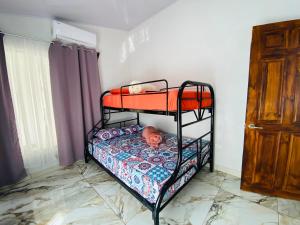 Postel nebo postele na pokoji v ubytování Blue Rriver House
