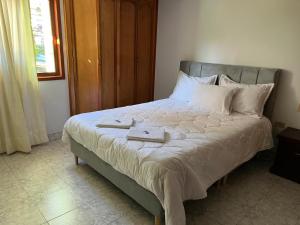 Postel nebo postele na pokoji v ubytování Hospedaje Los Cedros- Monguí