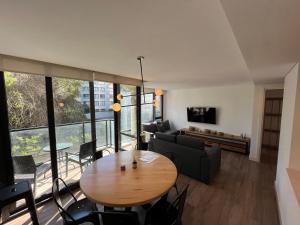 Et tv og/eller underholdning på EXCEPCIONAL DOS AMBIENTES ZONA GÜEMES, Mar del Plata