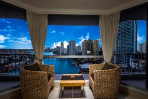 a balcony with a view of the city at Moorings On Cavill Surfers Paradise in Gold Coast