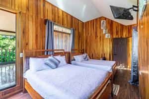 Postel nebo postele na pokoji v ubytování Montefresco Boutique Hostel