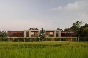 a rendering of a house in a field at Usawa Villa Nyanyi in Munggu