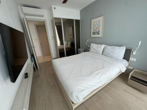 Ένα ή περισσότερα κρεβάτια σε δωμάτιο στο 2bedrooms Cassia Residence lake view +13 φωτογραφίες
