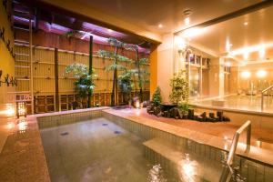 Bazén v ubytování Dogo Grand Hotel nebo v jeho okolí