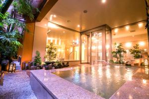 Bazén v ubytování Dogo Grand Hotel nebo v jeho okolí