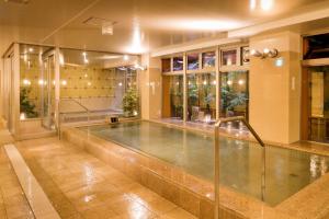 Bazén v ubytování Dogo Grand Hotel nebo v jeho okolí