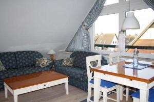 Posezení v ubytování Liiger-Hoern-DG-Wohnung-4-Moewe