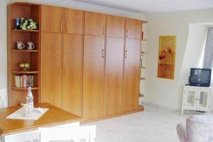 TV a/nebo společenská místnost v ubytování Haus-Ornum-3-OG-Wohnung-25