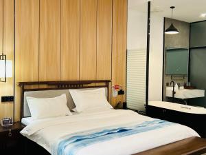 Qichi Waterfront B&B Hotel客房内的一张或多张床位