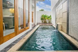 Πισίνα στο ή κοντά στο Calisee Villa by Kozystay - Denpasar