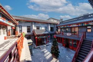 Balkón nebo terasa v ubytování Fuxue QiuGuo Hotel Beijing Nanluoguxiang Siheyuan Branch