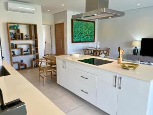 Cucina o angolo cottura di Turquoise Appart standing 2Ch Sdb, proche plages