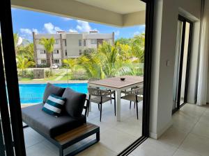 Piscina di Turquoise Appart standing 2Ch Sdb, proche plages o nelle vicinanze