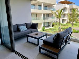 Area soggiorno di Turquoise Appart standing 2Ch Sdb, proche plages