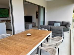 TV o dispositivi per l'intrattenimento presso Turquoise Appart standing 2Ch Sdb, proche plages