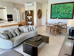 Area soggiorno di Turquoise Appart standing 2Ch Sdb, proche plages