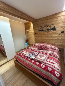 Postel nebo postele na pokoji v ubytování Residenze Vezza - Il Larice - + 37 fotografií