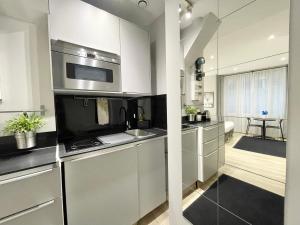 Η κουζίνα ή μικρή κουζίνα στο Charming Studio Paris la Défense