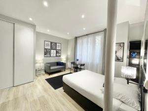 Ένα ή περισσότερα κρεβάτια σε δωμάτιο στο Charming Studio Paris la Défense