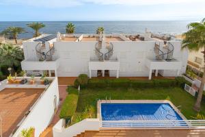 an aerial view of a house with a swimming pool at Brisa de Mar in El Pozo del Esparto