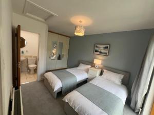 Ένα ή περισσότερα κρεβάτια σε δωμάτιο στο Wonderful D3 Townhouse +8 φωτογραφίες