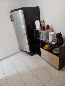 Dapur atau dapur kecil di Cameră cu baie Iulius Mall