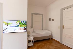 Postel nebo postele na pokoji v ubytování Gästehaus am Winckel