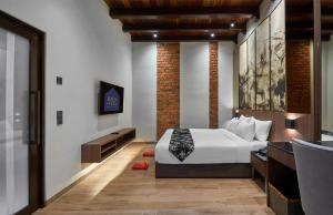 Postel nebo postele na pokoji v ubytování Baba House Melaka + 26 fotografií