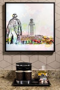 DoubleTree Suites by Hilton Austin Downtown Capitol的电视和/或娱乐中心